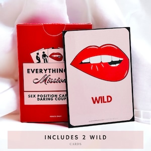 Everything But Missionary red card box laid on a white cloth background. Laying on top of the box is a sex position wild card, with an illustration of lips and teeth biting the bottom lip. Includes 2 wild cards!