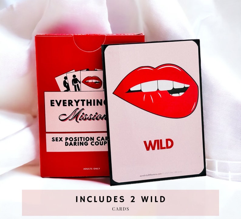 Everything But Missionary red card box laid on a white cloth background. Laying on top of the box is a sex position wild card, with an illustration of lips and teeth biting the bottom lip. Includes 2 wild cards!