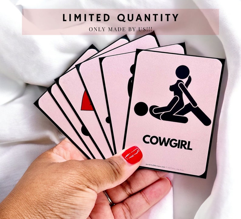 Everything But Missionary - Limited Quantity Sex Position Cards, held by the creator. Top card displays the "cowgirl" position, using stick figures.