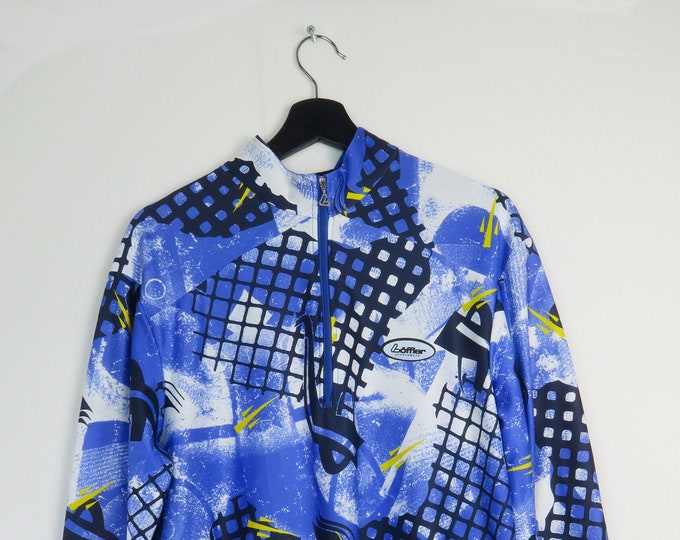 Vintage blue cycling jersey with abstract shapes and long sleeves