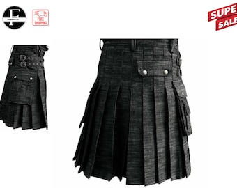 Könnte beinhalten: Ein schwarzer Utility-Kilt mit Falten und einer großen Cargo-Tasche an der Seite. Der Kilt hat einen Gürtel mit Schnallen und eine Klappe mit Knopfverschluss.