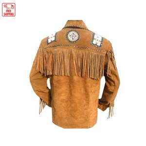 May include: A brown suede jacket with fringe detailing and Native American inspired embroidery. The jacket has a button-up front and long sleeves.