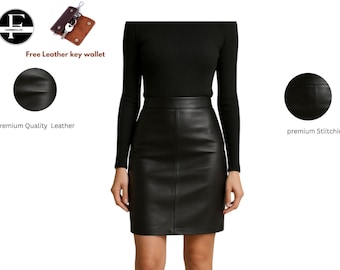 May include: A black leather skirt paired with a black long-sleeve top. The image also includes a free leather key wallet. The skirt is made of premium quality leather and features premium stitching.