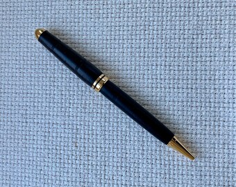 Ebony wood and gold trim ballpoint pen