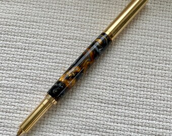 Brass pen with gold swirl Acrylester body and rollerball pen