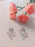 HALLE LOLLY Neon Clear. Huggie Earrings. Stainless Steel. Silvery and Golden. Clear Vivid Glass Beads. product logo