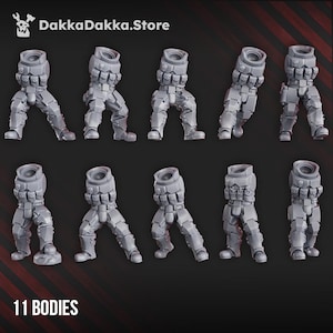 May include: Eleven grey miniature bodies, possibly for tabletop gaming or model building, are displayed. Each body features detailed armour plating and pouches. The text "11 BODIES" is at the bottom, and the store name "DakkaDakka.Store" is at the top.