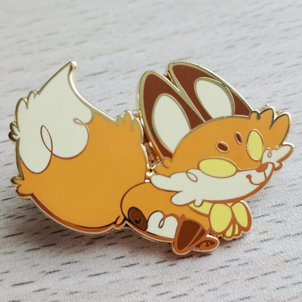 enamel pin -- red fox with yellow ribbon