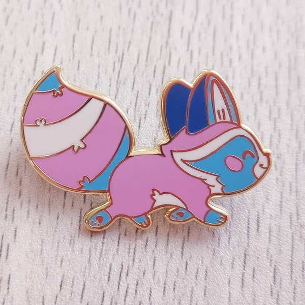 enamel pin -- egg the trans raccoon