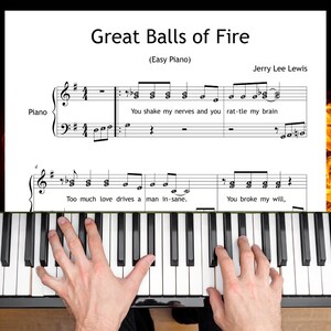 May include: A piano keyboard with a sheet music overlay. The sheet music is titled "Great Balls of Fire" by Jerry Lee Lewis. The text "Easy Piano" is also visible. The hands of a person are playing the piano.