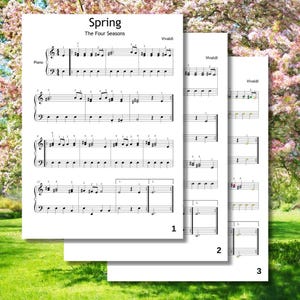 May include: Three sheets of piano sheet music for Vivaldi's "Spring" from "The Four Seasons." The top sheet is labeled "Spring" and "The Four Seasons." The music is printed in black on white paper. The background is a blurred image of a flowering tree and green grass.