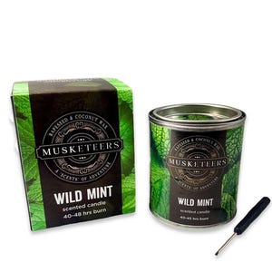May include: A green and black candle tin with the text "Wild Mint" and "Musketeers" on it. The candle is made with rapeseed and coconut wax and has a burn time of 40-48 hours. The candle is packaged in a box with the same design.
