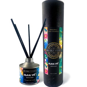 May include: A black and silver diffuser bottle with black reeds and a colourful label that says "Hawaiian Shirt Diffuser" with the scent "Pineapple and Coconut". The label also features a tropical floral design. The bottle is packaged in a black tube with a similar label.
