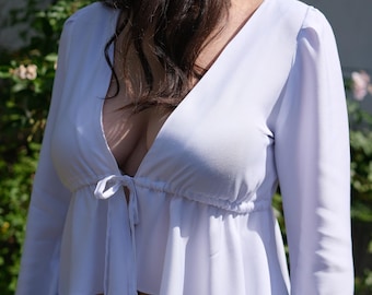 Blouse pattern with front tie, long sleeves, ruffles and frills
