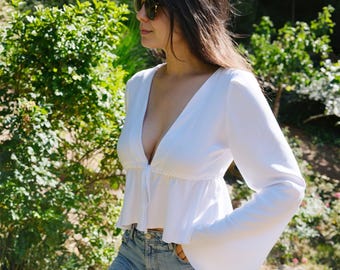 Blouse pattern with front tie, long sleeves, ruffles and frills