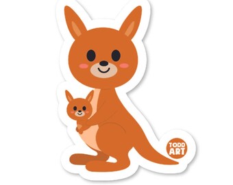 May include: A sticker featuring a cartoon illustration of a brown kangaroo carrying a joey in its pouch. The kangaroo has a smiling face and big eyes. The sticker has a white border and the text "TODD ART" in the bottom right corner.