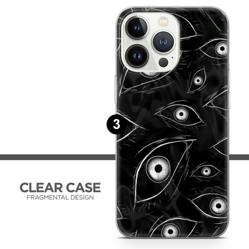 K&ouml;nnte beinhalten: Eine transparente Handyh&uuml;lle mit einem schwarz-wei&szlig;en Design aus vielen Augen. Die H&uuml;lle ist f&uuml;r ein iPhone 13 Pro Max konzipiert.