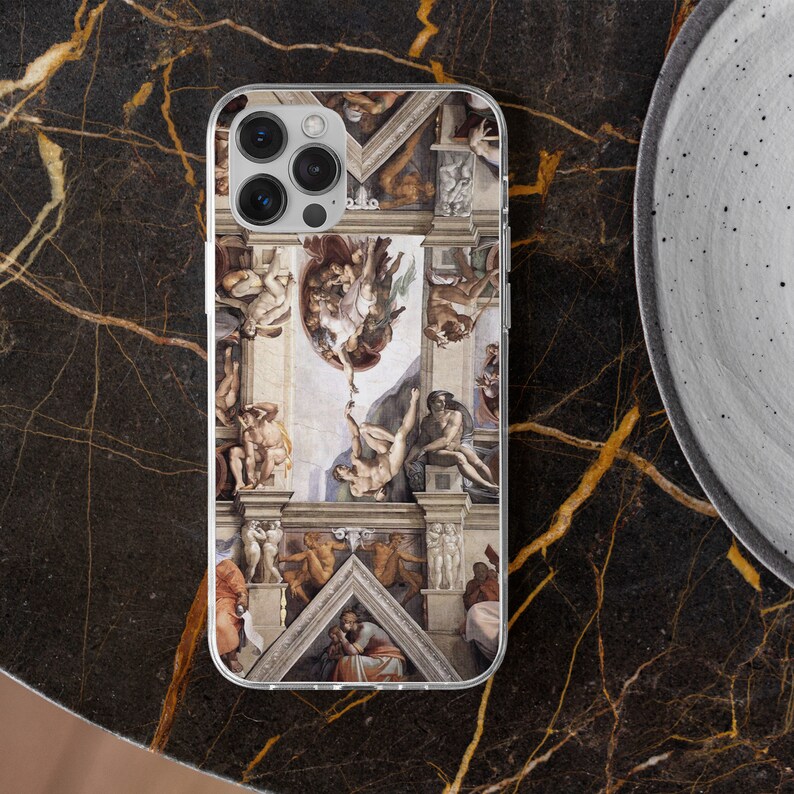 May include: A clear phone case with a colorful image of the Sistine Chapel ceiling. The image features a scene of God reaching down to touch the hand of Adam. The case is designed for an iPhone.