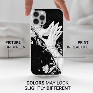 May include: A clear phone case with a black and white illustration of two hands intertwined with vines and roses. The background is a black starry sky.