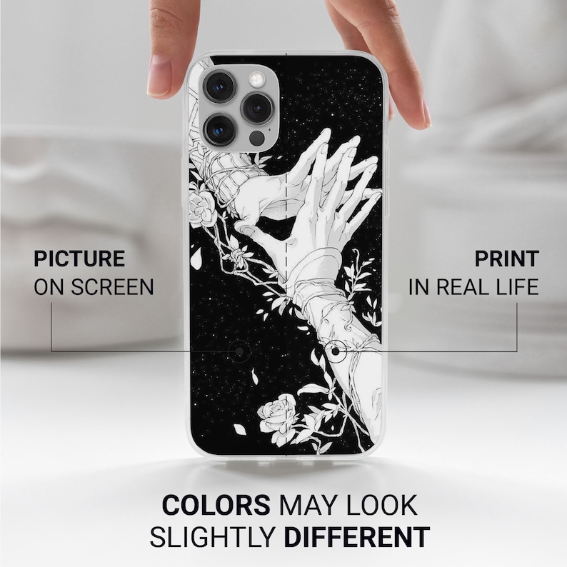 May include: A clear phone case with a black and white illustration of two hands intertwined with vines and roses. The background is a black starry sky.