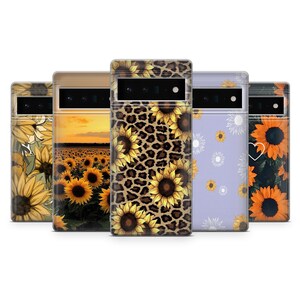 May include: Five different phone cases with sunflower designs. The cases are clear and show the phone's color through the design. The designs include a field of sunflowers, a sunflower and leopard print, a sunflower and white flower pattern, and a sunflower and green leaf pattern.