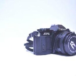 Canon AE-1 35mm SLR Film Camera with Canon 50mm f/1.8 FD Lens