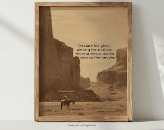 May include: Sepia-toned framed print featuring a landscape with a person on horseback. The print includes the text "Declare his glory among the nations, his marvelous works among the peoples!" and "1 Chronicles 16:29". The bottom of the print reads "Designed by Brigzbibles".