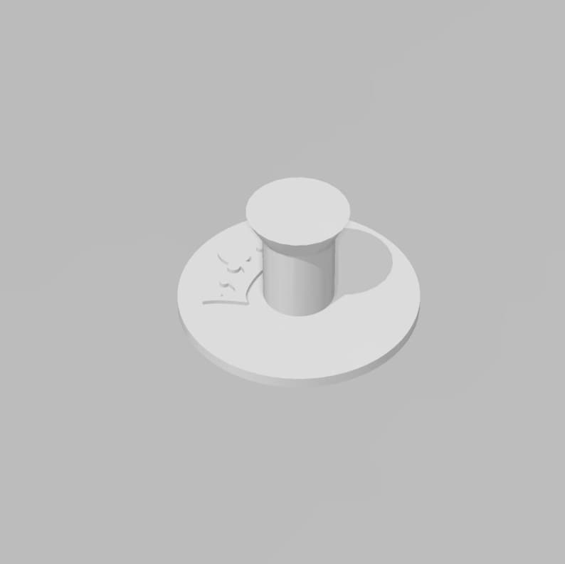 May include: White ceramic push pin with a round base and a cylindrical head. The base has a decorative design.