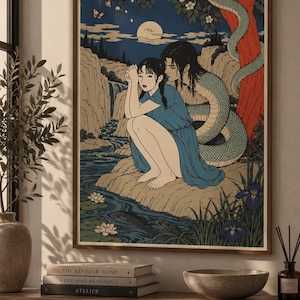 May include: A rectangular wall art print featuring a stylised illustration of a person in a blue dress sitting on a rock by a river with a large snake coiled around a red tree behind them, set against a dark blue night sky with a full moon.