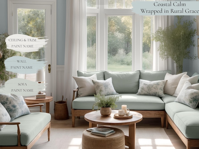 Cottagecore living room titled "Coastal Calm Wrapped in Rural Grace," featuring an SW 2863 Powder Blue sectional sofa with patterned throw pillows, a large window, a coffee table, and a side table. This Sherwin Williams Cottagecore color palette blends Powder Blue with soft neutrals for a coastal-meets-countryside living space.