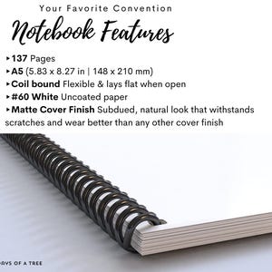 May include: A coil-bound notebook with white pages and a matte cover finish. The notebook is A5 size (5.83 x 8.27 inches) and has 137 pages. The text on the image reads "Your Favorite Convention Notebook Features".