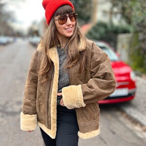 veste en peau de mouton vintage véritable cuir aviateur pilote fausse fourrure unisexe femme Homme oversize col sherpa bombardier brun foncé chaud en détresse xxl