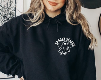May include: Black hooded sweatshirt with a white graphic of a ghost and the text "Spooky Season".