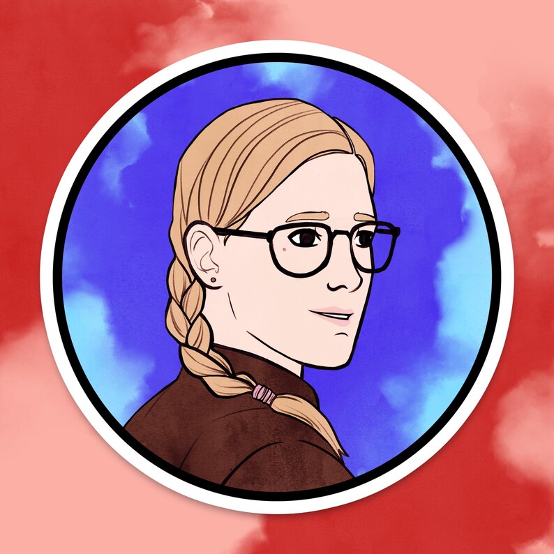 May include: A round sticker featuring a cartoon illustration of a person with blonde hair in a braid, wearing black glasses and a brown top. The background is blue with white and light blue clouds, set against a red background.