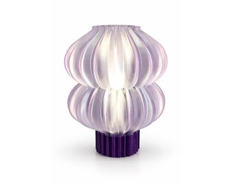 Lámpara de mesa inspirada en el ajo: luz ambiental, diseño moderno.