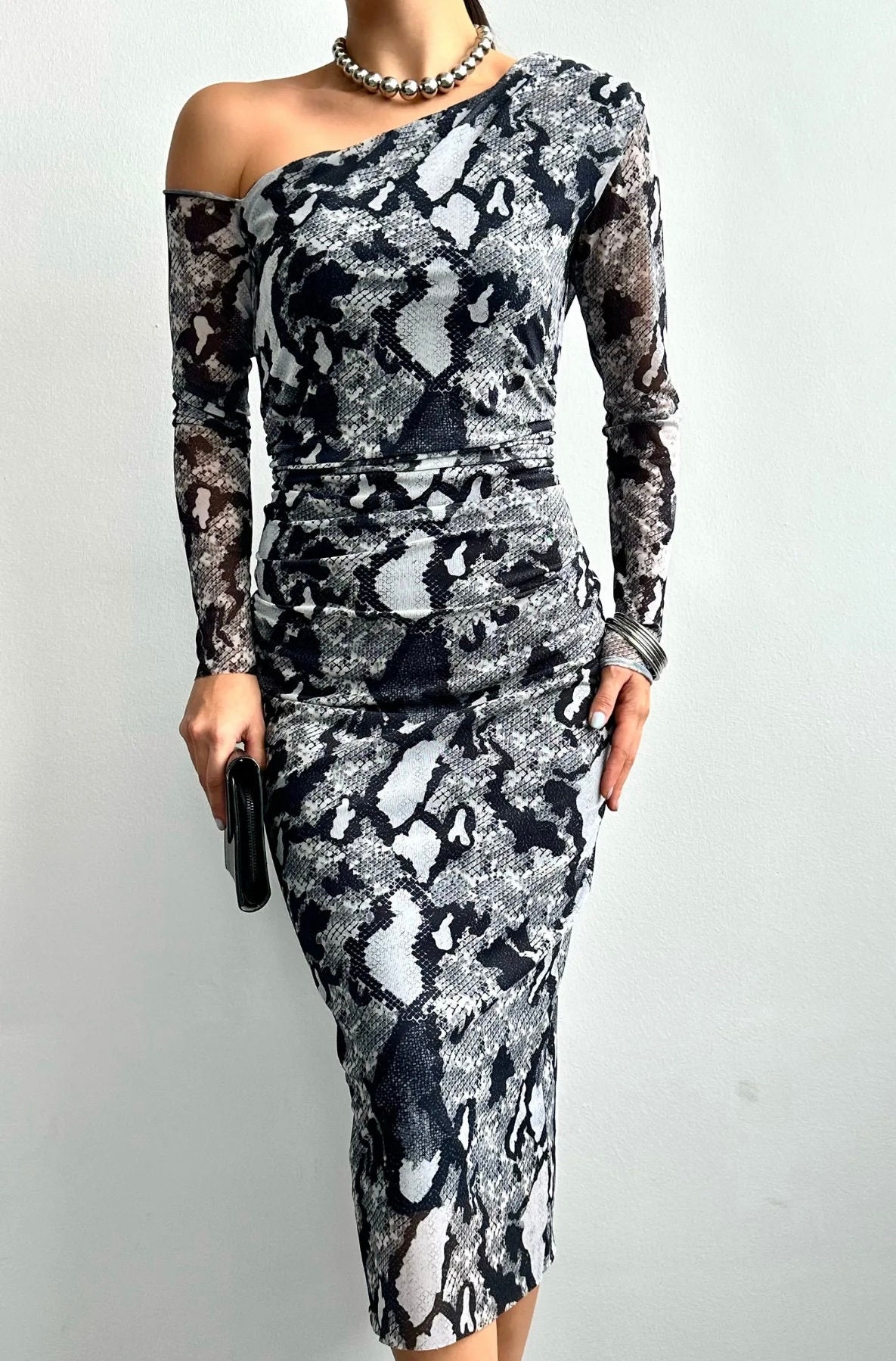 Vestito pelle clearance di serpente