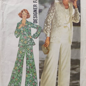 May include: A vintage sewing pattern for a women's trouser suit. The pattern is for size 10, bust 32 1/2 inches. The pattern is from Simplicity, pattern number 7002. The pattern is for a designer fashion trouser suit.