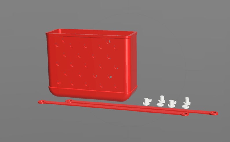 Puede incluir: Organizador de almacenamiento de pl&aacute;stico rojo con un dise&ntilde;o perforado y dos varillas de metal rojas. El organizador tiene cuatro pies de pl&aacute;stico blanco.