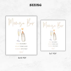May include: A printable sign for a mimosa bar with a champagne flute and a baby bottle with a heart above them. The sign says "Mimosa Bar" and includes instructions to "Pour the bubbly, splash some juice, garnish with fruit, enjoy!" The sign is available in two sizes: 8x10 inches and 5x7 inches.