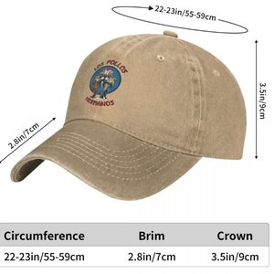 May include: A beige baseball cap with an embroidered logo that says "Los Pollos Hermanos". The cap has a 22-23 inch circumference, a 2.8 inch brim, and a 3.5 inch crown.