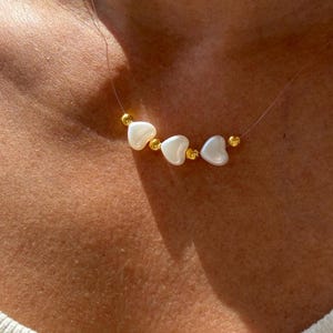 Collana personalizzata con cuore galleggiante: girocollo invisibile in nylon, chiusura in acciaio inossidabile