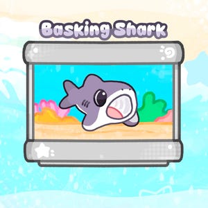 May include: A cartoon illustration of a basking shark in a rectangular tank. The shark is gray with a white belly and an open mouth. The tank has a blue background with coral and green plants. The text "Basking Shark" is above the tank.