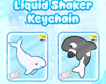 Könnte beinhalten: Illustration von zwei Flüssigkeit-Shaker-Schlüsselanhängern. Einer zeigt einen weißen Beluga-Wal, der andere einen schwarz-weißen Orca. Der Text "Liquid Shaker Keychain" steht oben.