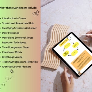 May include: A digital tablet displays a diagram about the vicious cycle of stress. The image includes a list of worksheets: Introduction to Stress, Stress Level Assessment Quiz, and more. A wooden decorative piece is next to the tablet.