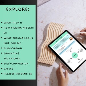 May include: A green and white digital tablet with the text "Explore: What PTSD is, How Trauma Affects Us, What Trauma Looks Like For Me, Dissociation, Grounding Techniques, Self-Compassion, Values, Relapse Prevention" on the left side of the screen. The right side of the screen shows a diagram with the text "What is Trauma?" and an arrow pointing to a circle with the word "Trauma" inside. The tablet is on a wooden surface.