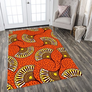 Tapete com motivos africanos: design tribal vermelho e amarelo
