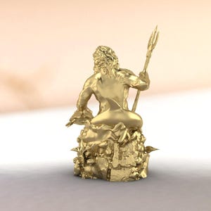 Nautical themed Neptune figurine, antiqued gold finish, sitting majestically on detailed underwater scene base with marine life