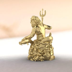 Gold-toned Neptune collectible figurine, sitting pose with trident raised, ornate ocean floor base featuring marine life and coral elements