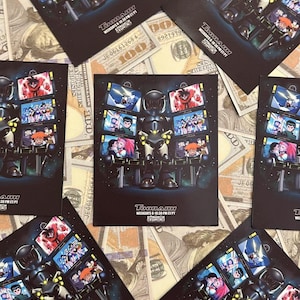 May include: Black promotional cards featuring a robot character surrounded by screens displaying anime scenes. The cards have the Toonami logo and show the time of the show. The background is a pile of US hundred dollar bills.