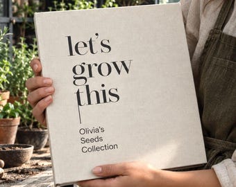 Pode incluir: Um livro quadrado com capa de tecido bege claro e texto preto na capa que diz "let's grow this" seguido de "Olivia's Seeds Collection" em uma fonte menor, apresentando um design limpo e simples.